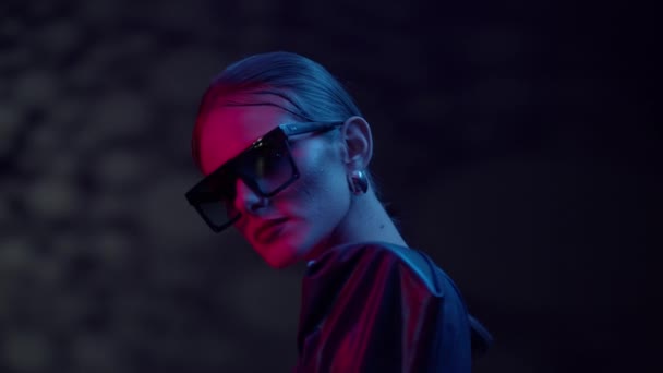 Beauty Fashion Model Girl Wearing Stylish Sunglasses On Light Blue Background. — Stock Video
