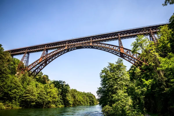 Old iron bridge over the river — Stock Photo, Image