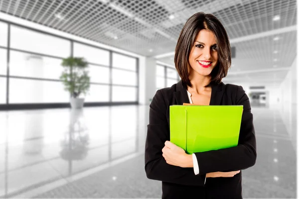 Smiling businesswoman in her office — Stock Photo, Image