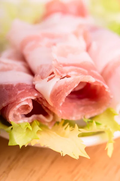 Sliced bacon close up - selective focus — Stock Photo, Image