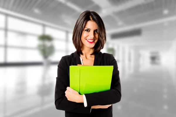 Happy business woman in her office — Stock Photo, Image