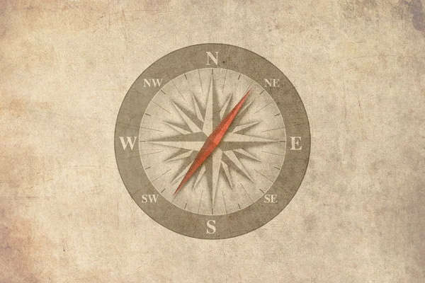 Compass over old paper background — Stock Photo, Image