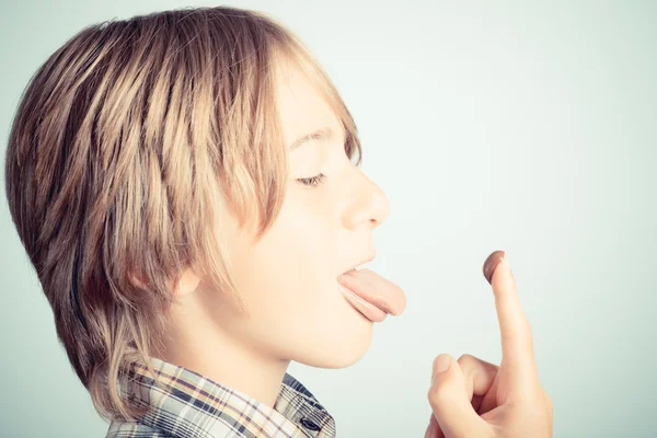 Little boy hazelnut cream — Stock Photo, Image