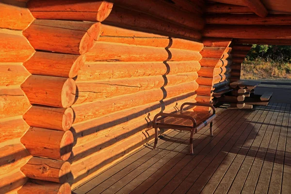 Metal Bench Log Cabin Porch Evening Sun Light — Stock Photo, Image