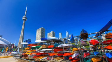 TORONTO / CANADA - JUNE 21. 2019: Toronto harbor front center formed in 1991 in an effort to create a waterfront park in Toronto. clipart