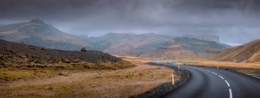 Panoramic view of mountainous landscape in Iceland on a cloudy day