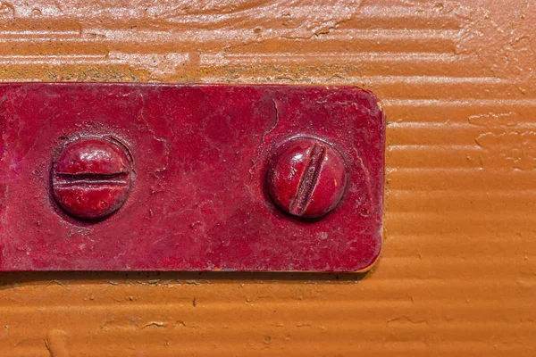 Screws Red Painted Bracket Mounted Orange Painted Wood — Stock Photo, Image
