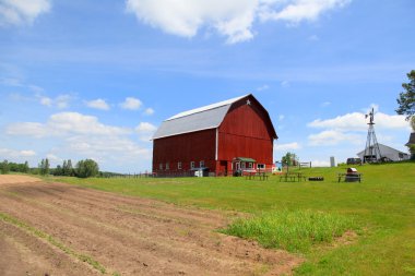 Red barn and farm landscape clipart