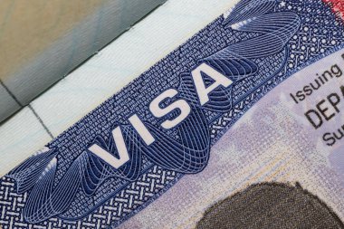 Close up view of Non immigrant USA visa stamp title on the passport.