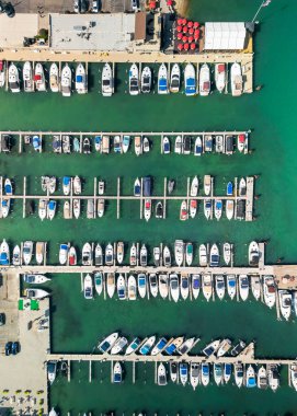 Aerial top down view of Motor city Marina, many boats docked at the shore in Wyandotte, Michigan