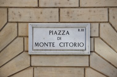 Old street sign at Montecitorio Square in Rome clipart