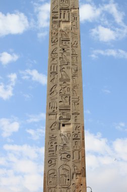 Egyptian obelisk in Quirinale Square of Rome clipart