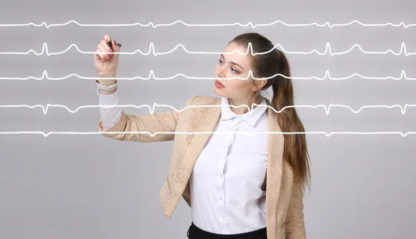 Doctor woman and cardiogram lines — Stock Photo, Image