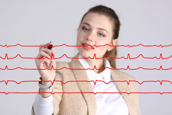 Medico donna e linee cardiografiche — Foto Stock