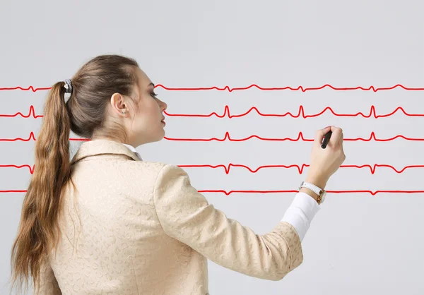 Arts vrouw en cardiogram lijnen — Stockfoto