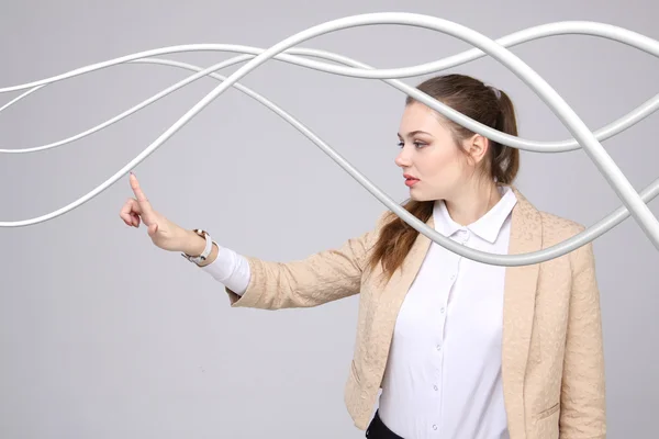 Mujer con cables eléctricos o cables, líneas curvas — Foto de Stock