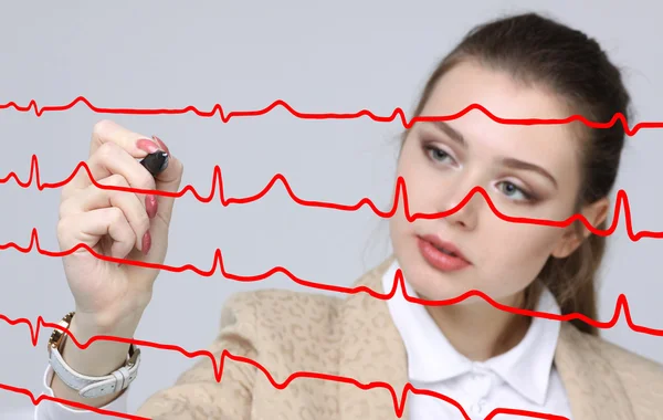 Doctor woman and cardiogram lines — Stock Photo, Image