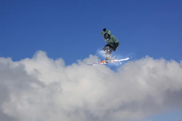 Flying skier on mountains. Extreme sport. — Stock Photo, Image