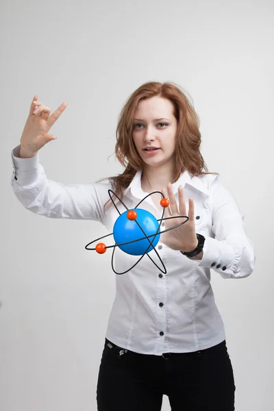 Woman scientist with atom model, research concept — Stock Photo, Image