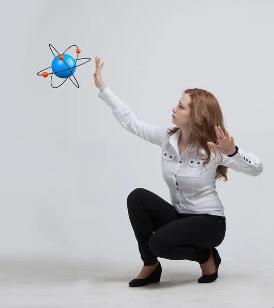 Woman scientist with atom model, research concept — Stock Photo, Image