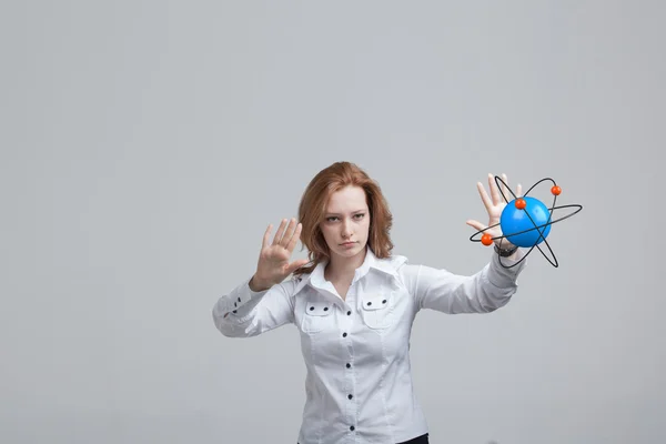 Woman scientist with atom model, research concept — Stock Photo, Image