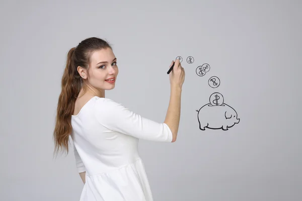 Jovem mulher desenho um porquinho Banco — Fotografia de Stock