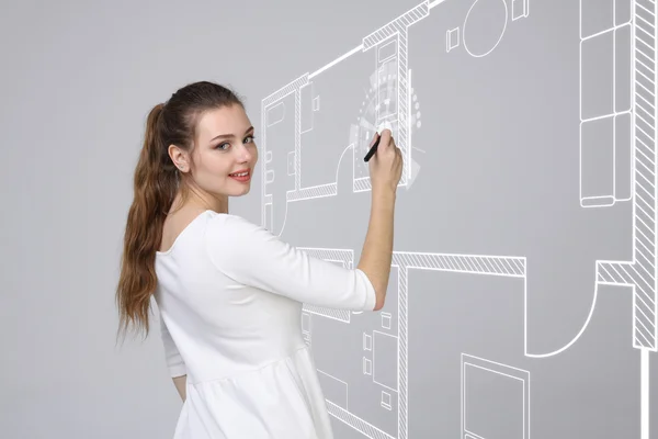 Vrouwelijke architect werken met een virtueel appartement plan — Stockfoto