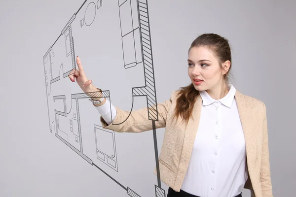 Kobiece architekt działający z planem wirtualnego mieszkania — Zdjęcie stockowe
