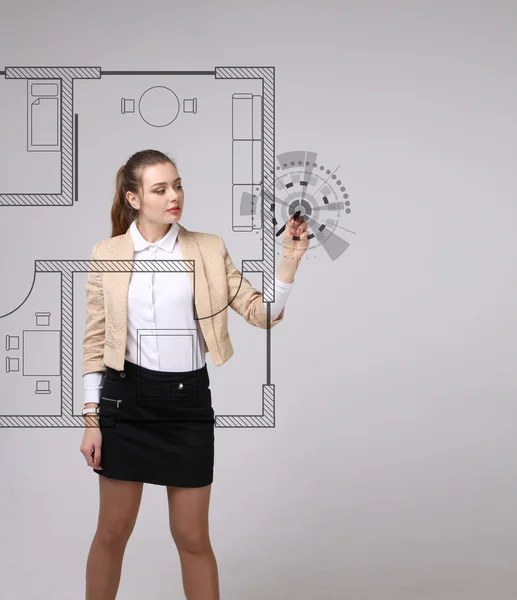 Female architect working with a virtual apartment plan — Stock Photo, Image