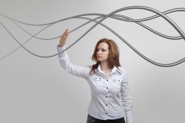 Elektrik kablolar ve teller, kadınla kavisli çizgiler