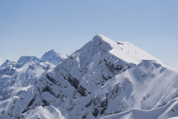 Mountain peak and blue sky — Stock Photo, Image