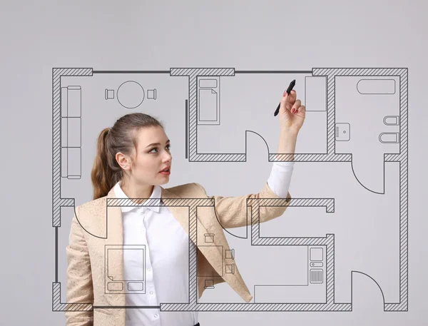 Vrouwelijke architect werken met een virtueel appartement plan — Stockfoto