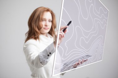 Geographic information systems concept, woman scientist working with futuristic GIS interface on a transparent screen. clipart