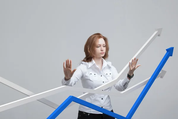 Businesswoman working with growth graph on grey background — Stock Photo, Image