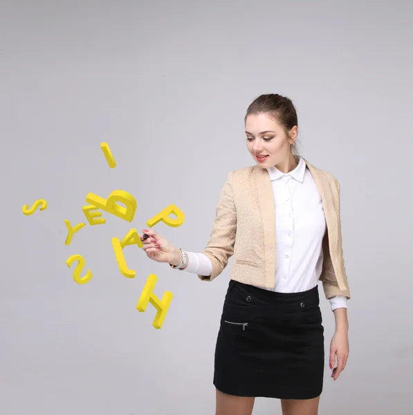 Woman working with a set of letters, writing concept. — Stock Photo, Image