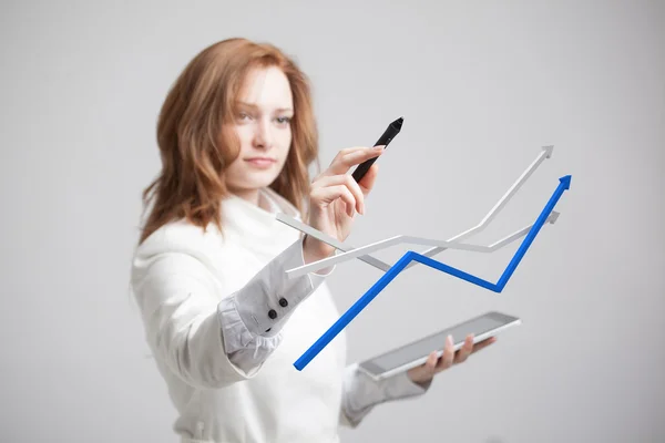 Businesswoman working with growth graph on grey background — Stock Photo, Image