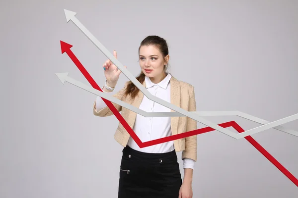 Businesswoman working with growth graph on grey background — Stock Photo, Image