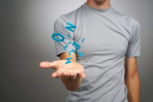 Hombre trabajando con un conjunto de letras, concepto de escritura . —  Fotos de Stock