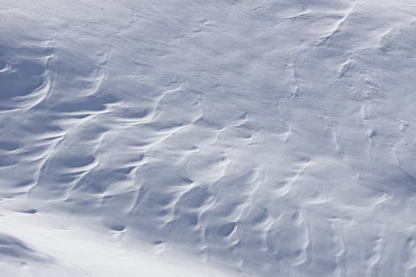 Texture de neige, surface créée par un vent — Photo