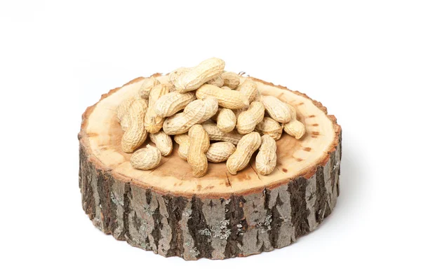 Pile of unshelled peanuts, isolated on white background — Stock Photo, Image