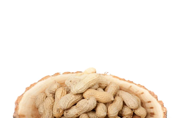Montón de cacahuetes sin cáscara, aislados sobre fondo blanco —  Fotos de Stock