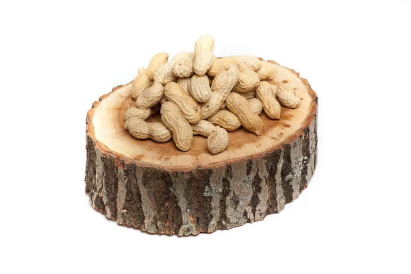 Pile of unshelled peanuts, isolated on white background — Stock Photo, Image
