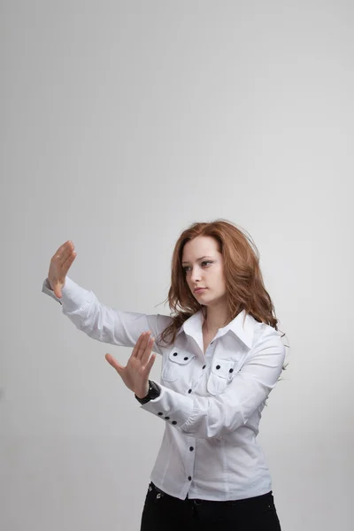 Young girl working with virtual screen — Stock Photo, Image