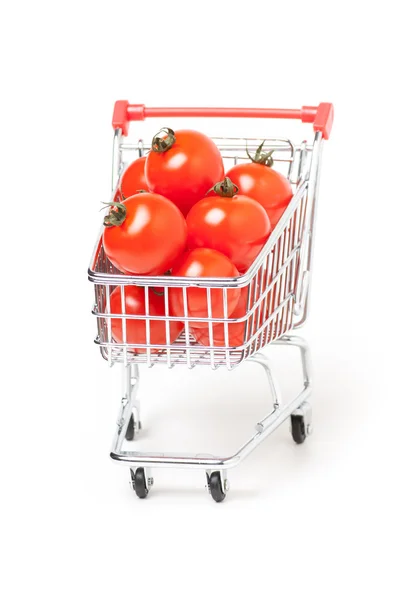 トマト、白で隔離されるショッピング カート — ストック写真