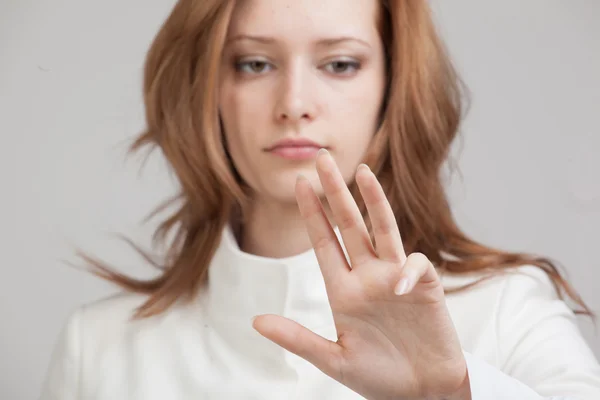 Young girl working with virtual screen — Stock Photo, Image