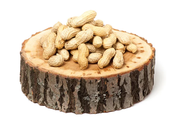 Pile of unshelled peanuts, isolated on white background — Stock Photo, Image