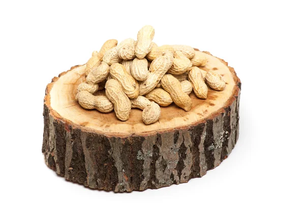 Pile of unshelled peanuts, isolated on white background — Stock Photo, Image