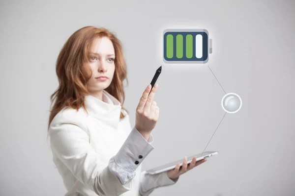 Woman holding tablet and pen, battery level icon — Stock Photo, Image