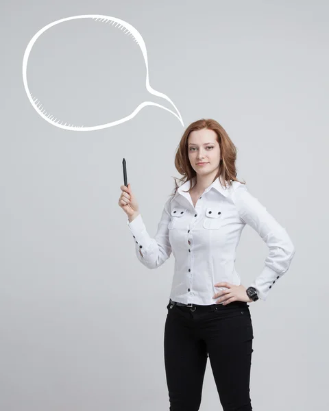 Vrouw schrijft in een geschilderde toespraak wolk — Stockfoto