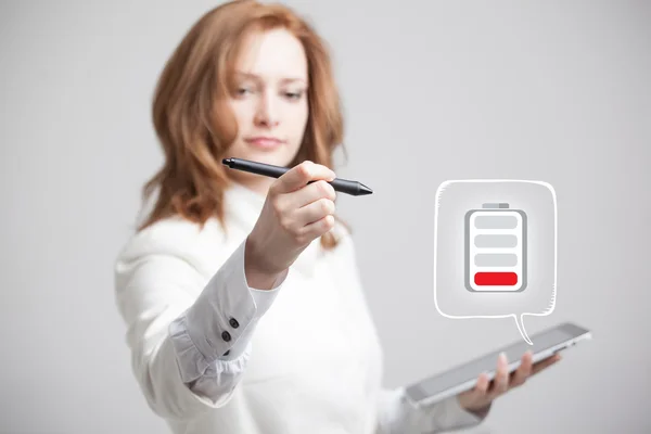 Woman holding tablet and pen, battery level icon — Stock Photo, Image